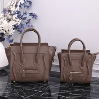 Bolsa de Luxury Designer Bags Mini Nano Micro Luggage Bolsa em Bolsa de Calfskin Smiley Bolsas Cosm￩ticas de Alta qualidade Tote Tote