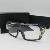 Sonnenbrillen Kapelus M￤nner und Frauen verbunden mit gro￟em Rahmen unregelm￤￟ig enth￤lt eine schwarze Box