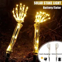 Other Event Party Supplies 2pcs Skeleton Hand Solar Light Outdoor Lighted Skeleton Arm Stakes Solar Glowing Skull Hands Halloween Decor Garden Lawn Lamp 220829