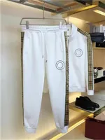 Diseñador de chándal para hombres hombres de lujo trajes de sudor de manga larga de manga larga para hombre casual trajes de ropa pantalones chaqueta de dos piezas traje deportivo M-3xl