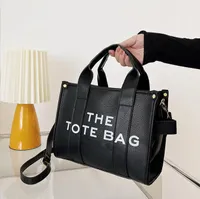 Lyx The Tote Bag designer kvinnor mini stor duk läder marc crossbody axel handväskor med rem svartrosa totes väskor handväska pvc h0011