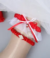 2ピース花嫁のための白い赤い結婚式のブライダルガーターセットウェディングブライダルレッグガーターはstock7058442で安い