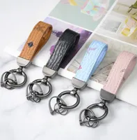 Luxury Car Keychain Bag Pendant Charm Jewelry Flower Key Ring Holder for Women Men Fashion PU Leather Animal Tassels Key Chain Acc8714412