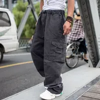 Joggers грузовые брюки мужчины Harem Multi-карманный камуфляж Man Cotton Sweatwans Streetwear Повседневная плюс брюки M-7xl