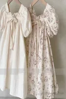 INS Niñas Vestidos con estampado floral para niños Puffes de cuello cuadrado Bows Princess Dress Summer Children Clothing Q72211579335