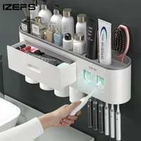 Toothbrush Holders IZEFS Magnetic Adsorption Inverted Toothbrush Holder Double Automatic Toothpaste Dispenser Storage Rack Bathroom Accessories Set 221205