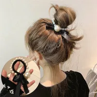 Vintage Bowknot Pearl Elastic Hairband för kvinnor huvudbonader elegant fjäril gummiband pannband flicka hårtillbehör