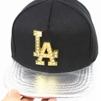 قبعات الكرة الجديدة أزياء برشام رسالة LA Hip Hop Punk Baseball Cap for Man Women Sunscreen Cotton Cotton Faux Leather Bar Rock Club Trend Hats 1206
