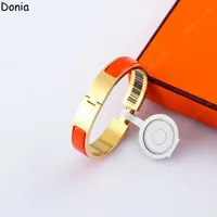 Donia -sieraden Europese en Amerikaanse email 12 mm brede titanium stalen brief luxe armband met doos