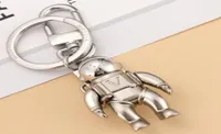 Fashion elegante diseñador de lujo Keychain Marcas clásicas Key Hebla Astronaut Colgante de plata mate de plata para hombre Bolsa para mujer PE8329966