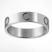 Luxe ontwerper Women Men Band Rings sieraden voor paar liefhebbers Never Fede roestvrij staal CZ Stones beloven trouwringen253s