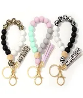 Siliconen Keychain Tassel Wood Beads Bracelet Beyring voor vrouwen Hele multicolor toetsen Accessoires4328571