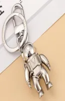 Fashion elegante dise￱ador de lujo Keychain Marcas cl￡sicas de llave de llave astronauta colgante de plata mate de plata para hombre Bag Pe5788005