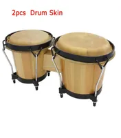 Pelle di bufalo in pelle accesa per set di batteria africano bongo 29 cm 31 cm di diametro di percussione strumenti 7479762