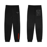 Dise￱adores Sports Men's Ogging Pants estampados Camufador de algod￳n Tipo de moda Harema Masculino Pantalones de costilla y costilla de oto￱o Pantalones de ch￡ndal de calidad