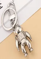 Moda elegante designer de luxo Keychain Classic Brands Key Buckle Astronaut Pingente Matte Silver Keychains para homens BACA feminina PE6952381