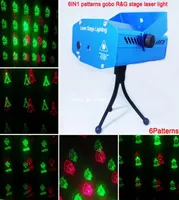 Wholenew mini Red Green Laser 6 patterns Christmas projector Party DJ Lighting lights Disco bar Dance xmas stage Light show X2263931