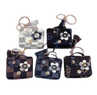 Designer Keychain Luxury Leather Bucket Flower HeadsetSet Bag Key Chains Storage Pendant Women Accessories Keyring Gift