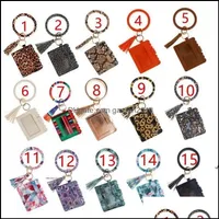 Party Favor Leopard Print Pu Leather Tassel Pendant Bracelet Ladies Keychain Wallet Card Package Business Holder Rrb14602 Drop Deliv Ot6E3