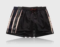 2022 designer Men&#039;s Pants style waterproof fabric trackpants summer beach pants men&#039;ssurf shorts swimming trunks sports
