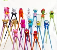Chopsticks 100 par blandade färger tecknade barn barn present studie träning silikon huvud grossist