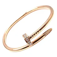 Ca klassiska armband guld silver nageldesigner armband titan stål manschett armband nlay diamant armband kvinnor mens älskar smycken gåva med låda