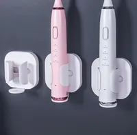Den senaste 7.3x7cm Gravity Sensing Electric Tooth Brush Holder Många färger att välja från Support Custom Logo