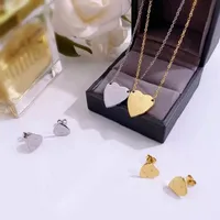 Europa America Jewelry Sets Women Lady Titanium Steel G Letter 18K Brincos de ouro colabora￧￣o de colares de designer de designer de designer de cora￧￣o Correntes de amor de luxo