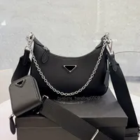 Designers väskor triangel bokstavskedja påsar läder handväskor quiltade gitterkedjor slår lyxig handväska för kvinnliga kvinnor mode svart axelväska crossbody