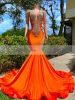2023 Arabische prom -jurken luxueuze kralen kristallen Rhinestone oranje Deep V nek avondjurk zeemeermin formele feestjurken open rug mouwloos
