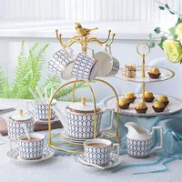 Atmosfera de moda Mulan Gold Gold Line Ceramic Tea Conjunto OEM Design de porcelana Copo de caf￩ e pires set248o
