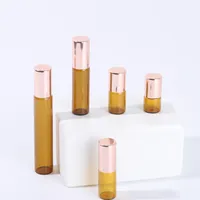 500pcs 1ml 2ml 3ml 5ml amber perfume roll rond bottle مع زجاج/الكرة المعدنية بني أسطوانة قوارير أساسية