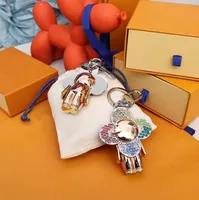 Diamond Keychain Wallet Designer de luxo de luxo Sun-Flower Doll Key Key Bags Saco pendente Carabiner chaveiros