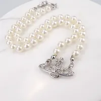 Nya Desiger -halsband Kvinnliga smycken Choker Pearl Chain Fashion Saturn Halsband Klappkedjor H￶gkvalitativa 4 f￤rger
