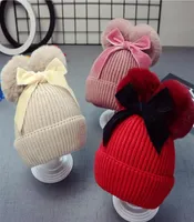 9styles Double Fur Ball Bow Hats Baby Pom Pom Geanie Cap Infancia Ni￱os Baby Girl Winter Winter Crochet Cabellado Accesorios de sombrero Caps29929157
