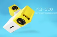 بيع المصنع YG300 LED جهاز الإسقاط المحمول 400600LM 35 مم الصوت 320 × 240 بكسل yg300 HD USB Mini Media Player5972246