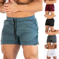 M￤n Solid Elastic midja tr￤ningstr￤ning shorts byxor som k￶r tr￶jor med dragskovaror casual fitness shorts291w