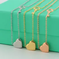 Joyería de diseñador Cabello de colgante de corazón tridimensional Collar de oro Collares Anillos para mujeres Baceras de lujo Pendientes de lujo Amantes de los amantes del titanio