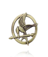 Entero 10pcslot The Hunger Games Animals Birds Brooches Joya de pel￭cula cl￡sica Joya de estilo vintage popular Pins de esmalte Spilla 24689552