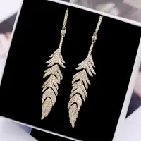 Pendientes de sementales Gold de lujo Color de plata cúbica Cristal Long Tassel Feather Delgle For Women Party Leaf