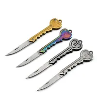 Bärbar nyckelform Mini Folding Knife Outdoor Camping Hunting Keychain Knives Pocket Fruit Knife Multifunktionell Taktisk nyckel Keyring Självförsvar EDC Survival Tool