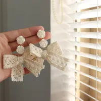 Pendientes de semental Llegada clip de nudos de arco blanco vintage en Declaraci￳n de moda de la mujer Rose Flower Buen regalo