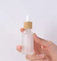 Cosmetic Empty Frosted Container Refillable Essential Oil Dropper Bottles 5ml 10ml 15ml 20ml 30ml 50ml 100ml with Bamboo Lids1656107