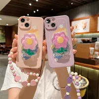 Fashion women phone cases iPhone 14 13 12 11 pro max 8 7 6s x xs xr Rainbow Flower bracelet Silicone lens protection