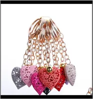 Aessories20PcsLot Whole Hollow Heart Fashion Charm Cute Purse Bag Pendant Car Keyring Chain Ornaments Gift Keychains T200804 7980472