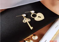 Fashionnew earrings temperament small fresh brand pearl love lock key asymmetric earrings 925 silver needle female1436256