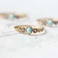 Pierścień srebrny dla kobiet wzór morza larimar tanzanit biały topaz kamień szlachetny złota platowana biżuteria LMRI144 Klaster Pierścienie 213J