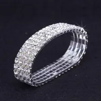 12 Stücke Lot 4 Reihenkristall Diamante Strass elastisches Brautarmband Dehnung ganzer Hochzeitszubehör für Frauen266K