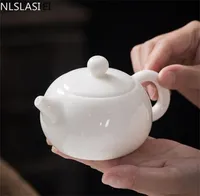 NLSLASI Chinese Handmade white porcelain teapot ivory Tea pot ceramics Teaware infuser Pu039er Oolong filter kettle 210724