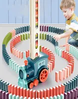 The electric domino train robot is automatically placed on the children sound and light educational toy cara37